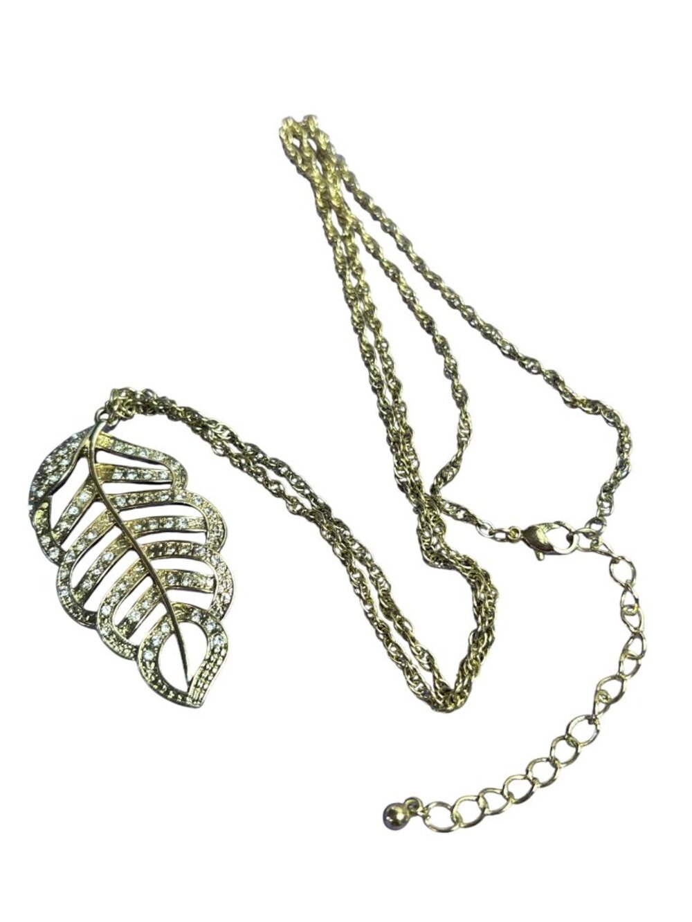 Goldtone Clear Rhinestone Leaf Pendant Necklace 30 - 33 inches Long 2.25 inch Pe